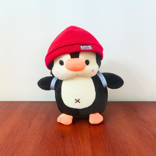 Pingüino gorro rojo