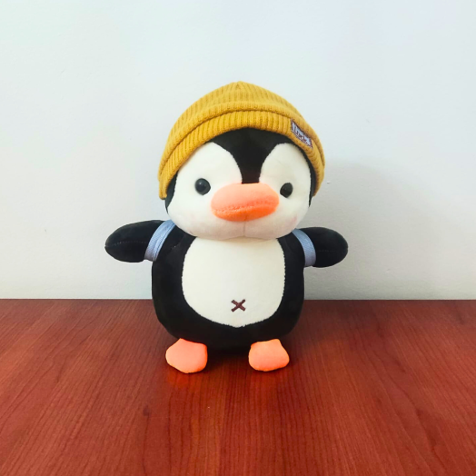 Pingüino gorro mostaza